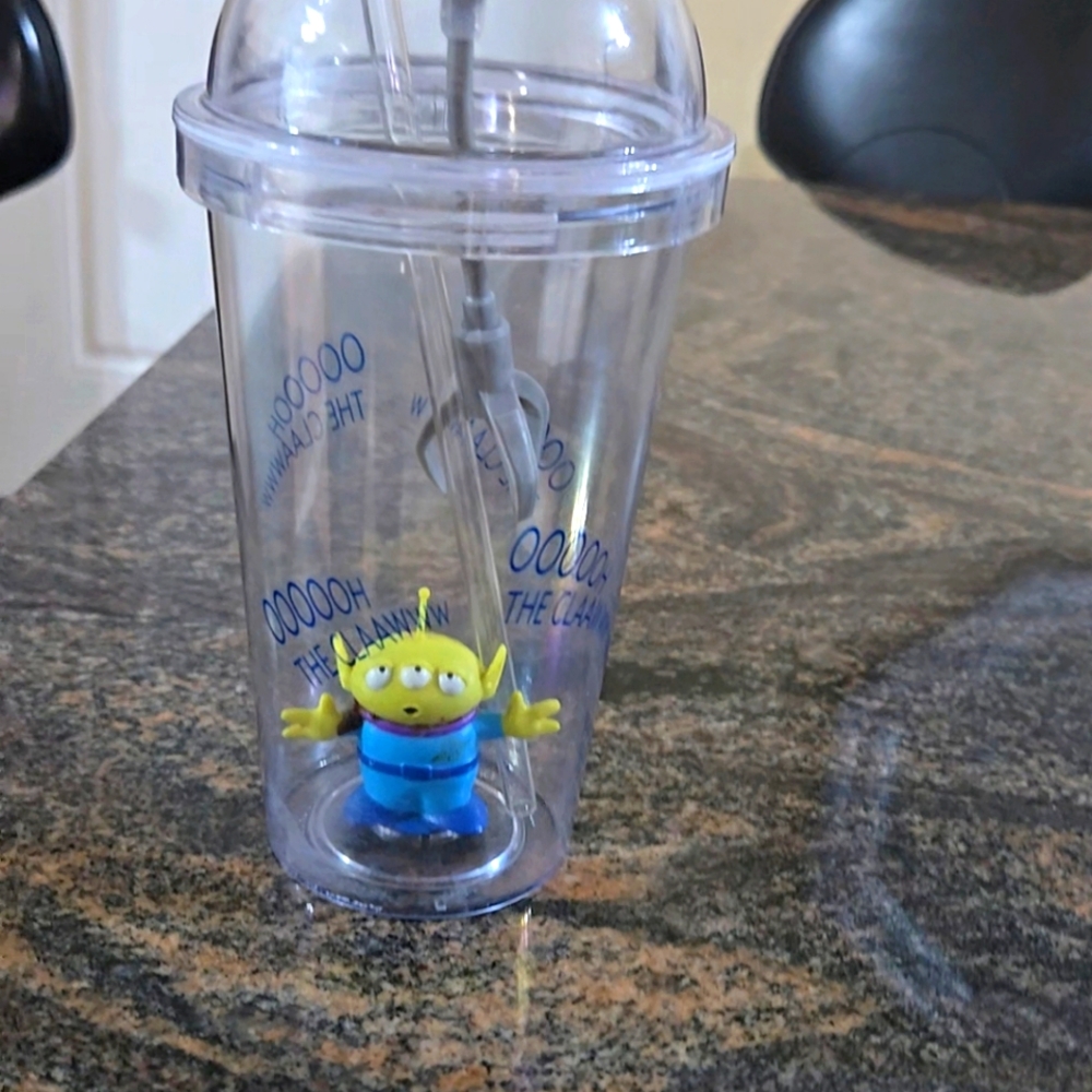 The item shown is a Disney Pixar Fest 2018 Light-Up Alien Plastic Tumbler.
